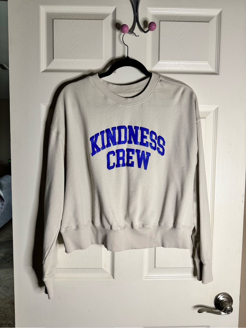 Old Navy Cream Sweatshirt with Royal Blue 'Kindness Crew' Graphic